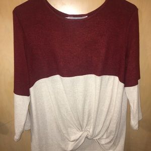 Two tone brushed knit top with front twist